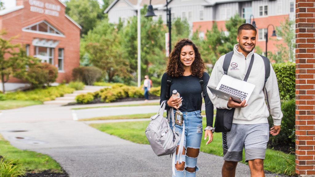 Male and female walking outside